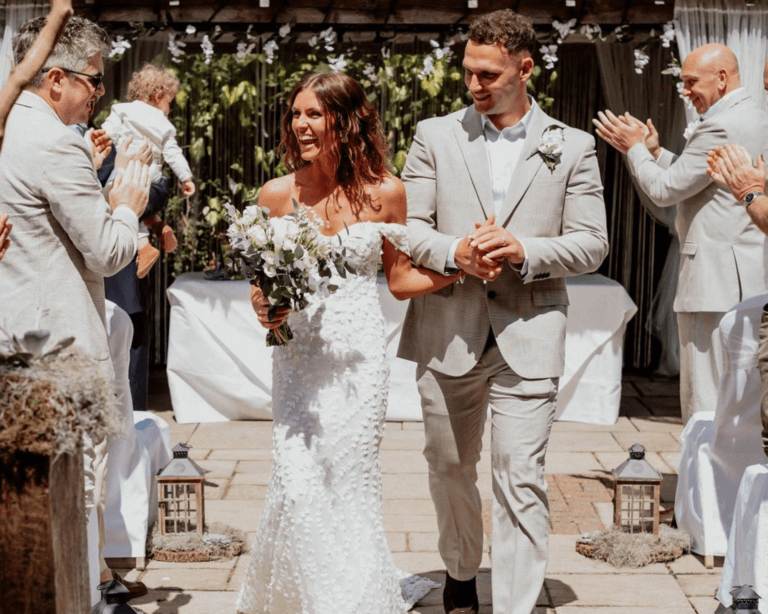 Oliver & Olivia's wedding: Walking back down isle together