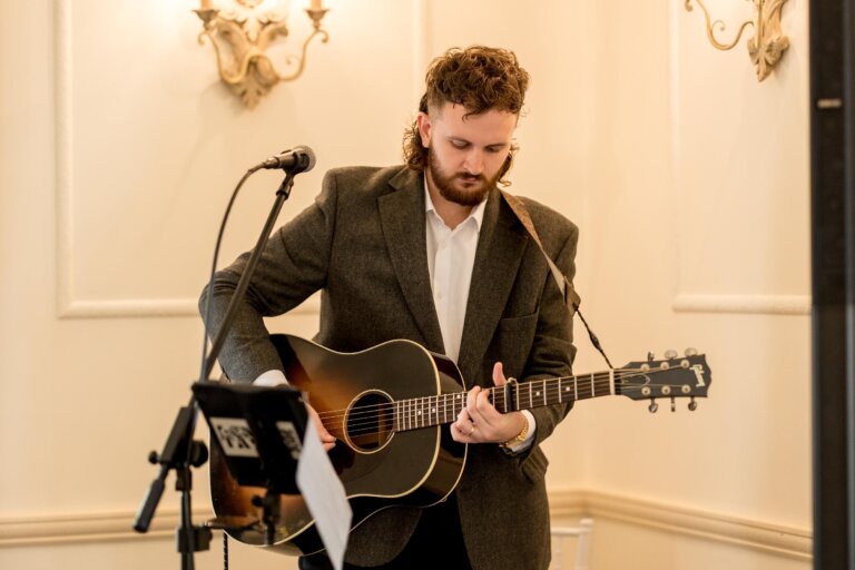 Guitarist plays for the wedding ceremony